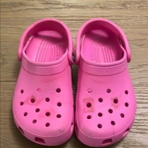 Pink Crocs men 4, women 6.